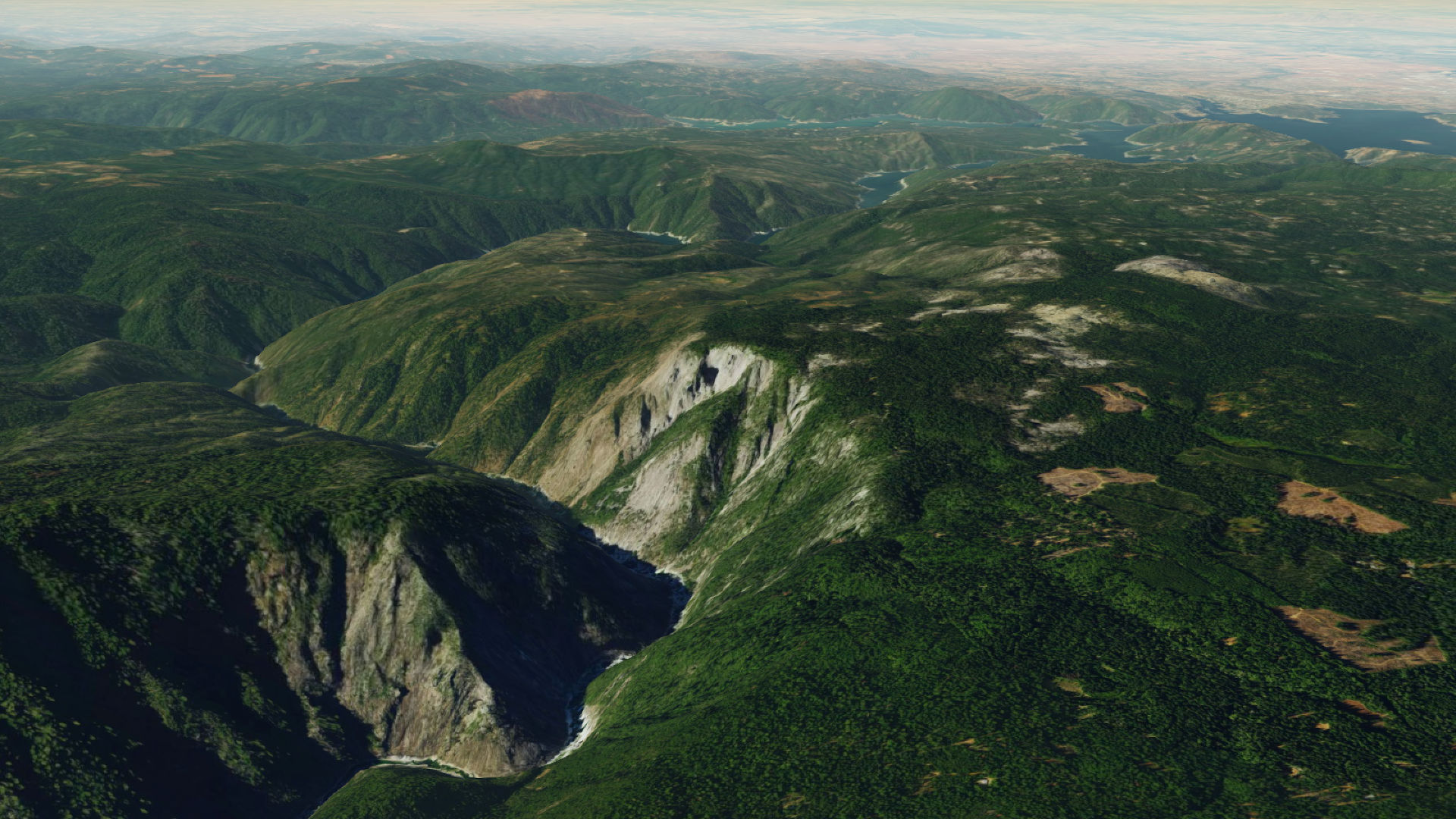 Combine 3D terrain and high-res aerial imagery from MapTiler to create photorealistic scenes like this one